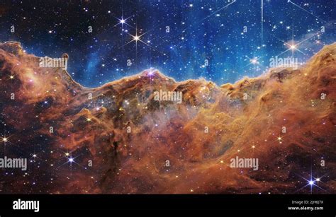 NASA’s Webb Reveals Cosmic Cliffs, Glittering Landscape of .